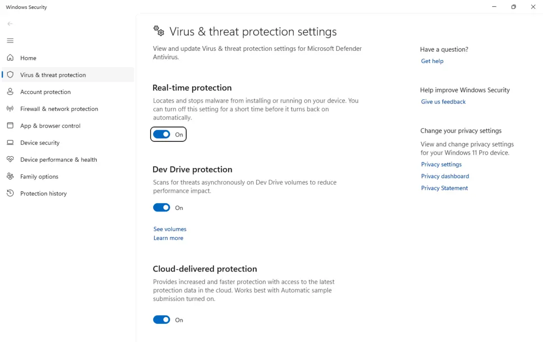 Windows Security - Virus & threat protection settings with real-time protection and cloud-delivered protection turned on